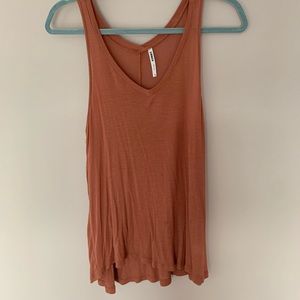 Two V neck tanks